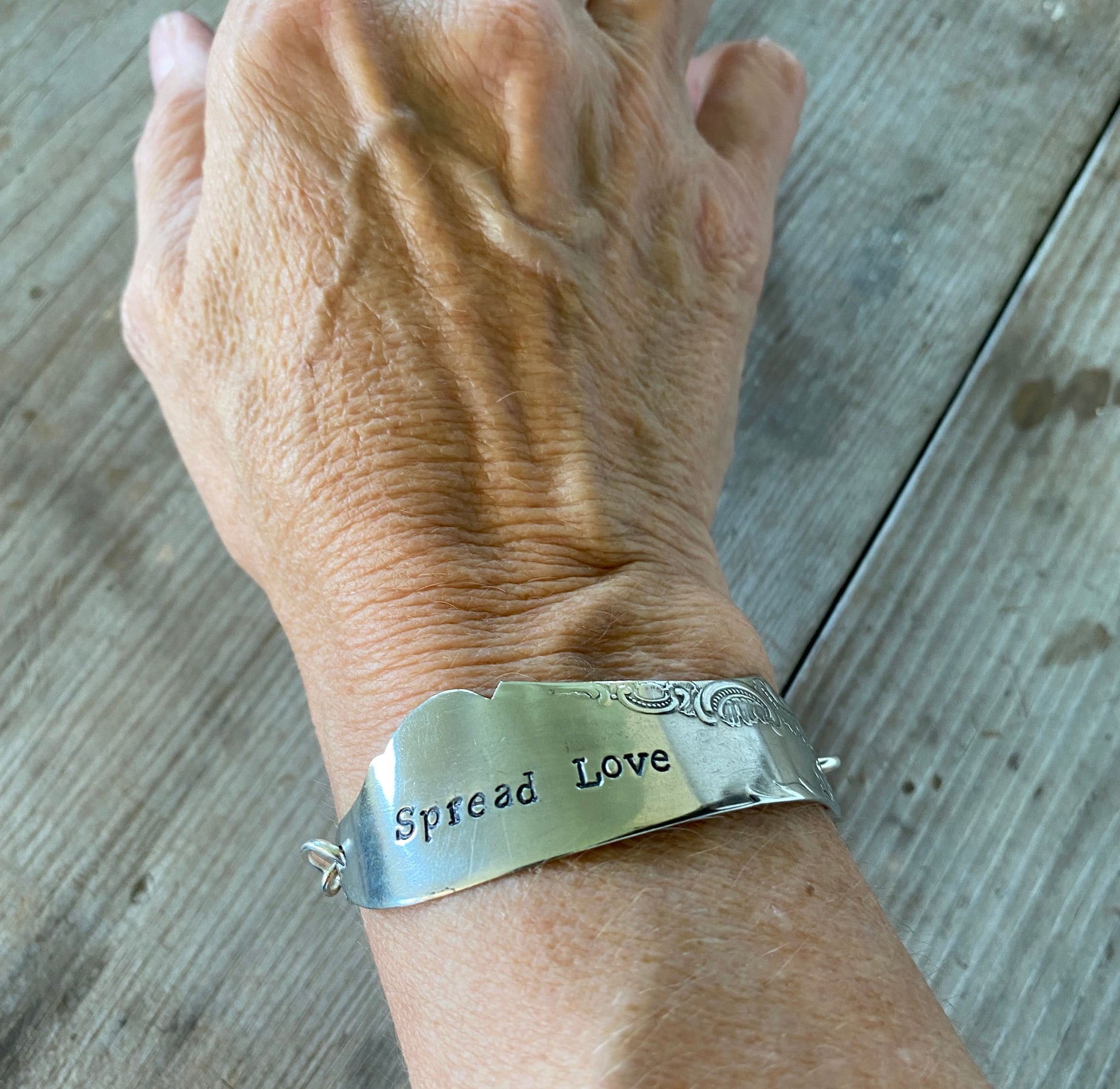 Spread Love Handstamped Antique Butter Knife Bracelet Shown on 6" wrist