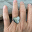 Upcycled Silverware Spoon Heart Ring shown on model's hand