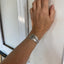 DO EPIC SHIT hand-stamped spoon cuff bracelet shown on model wrist - vintage 1912 International Silver from Hotel Nicollet with motivational message