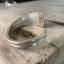 Close-up detail of stamping of hotel nicollet proof of authentic vintage hotel silverware hand-