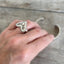 Grosvenor heart ring shown on hand - whimsical handcrafted upcycled silverware jewelry
