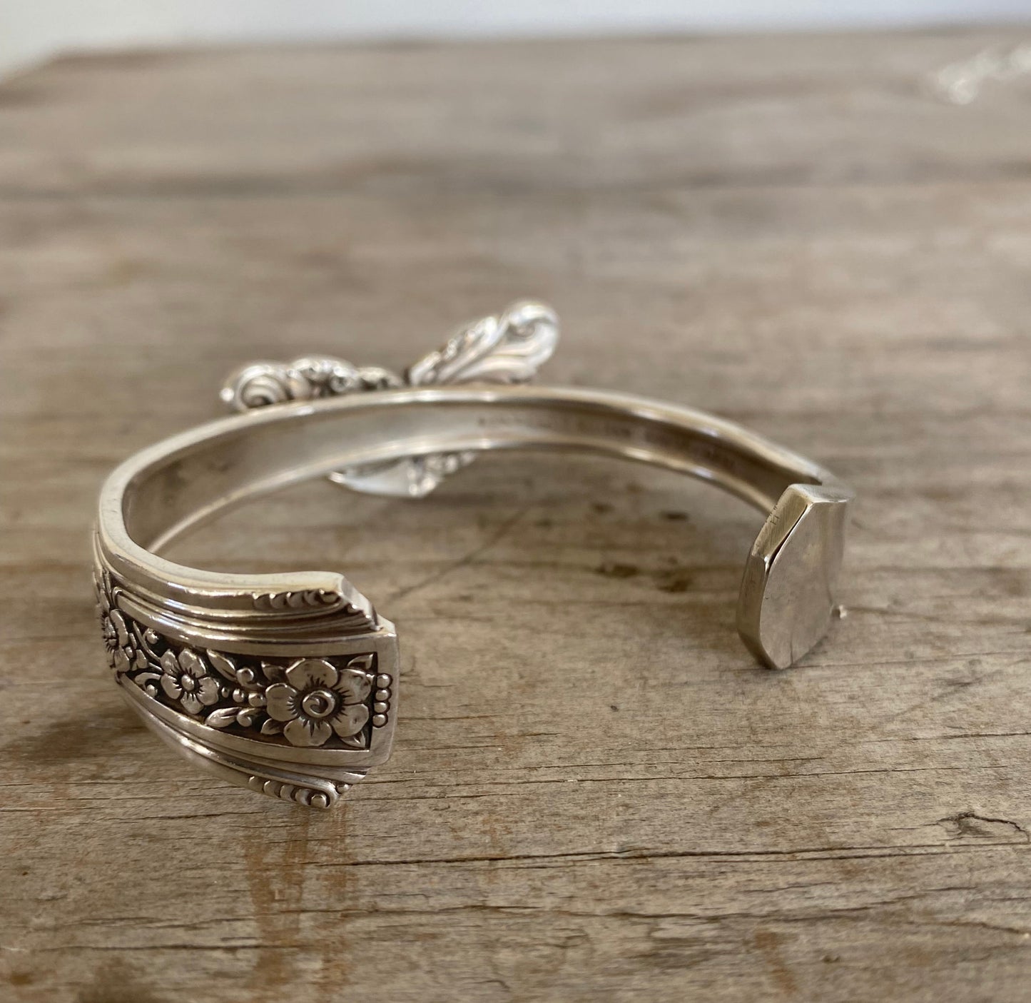 Back view of heart spoon cuff bracelet from upcycled vintage silerware handles