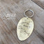 Hand-stamped vintage spoon keychain Enjoy the Journey detail showing antique silverplate patina