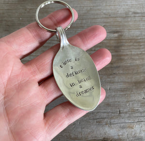 Stamped Spoon Keychain - THERE IS A DEFIANCE IN BEING A DREAMER