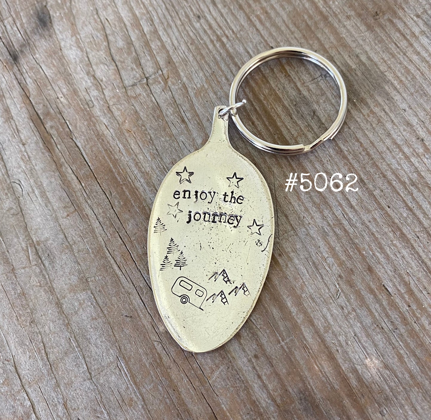 Enjoy the Journey spoon keychain close-up displaying hand-stamped lettering and vintage patina on vintage silverware