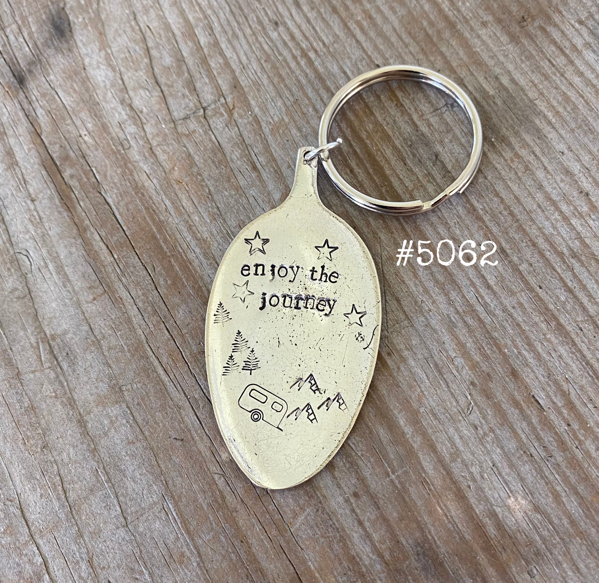Enjoy the Journey spoon keychain close-up displaying hand-stamped lettering and vintage patina on vintage silverware