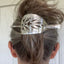 Handmade Hari Barrette from Upcycled cake server shown on Model