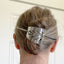 Hair Barrette from Upcycled Cake server shown on model