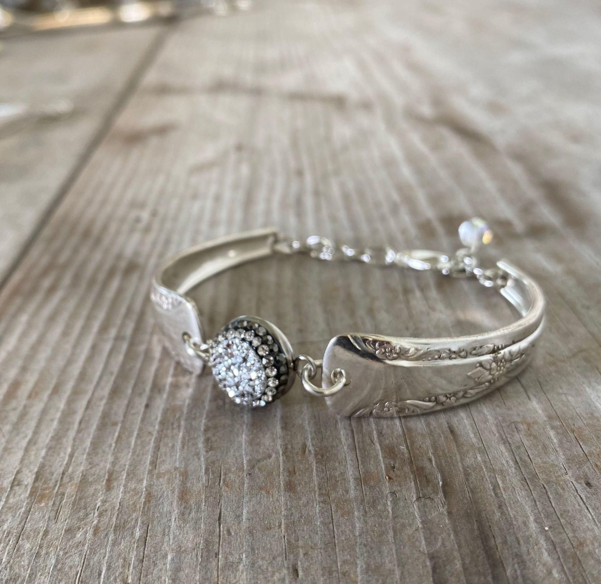 Close-up detail of Camelia spoon links with druzy pavé centerpiece bead - handcrafted artisan vintage silverware bracelet