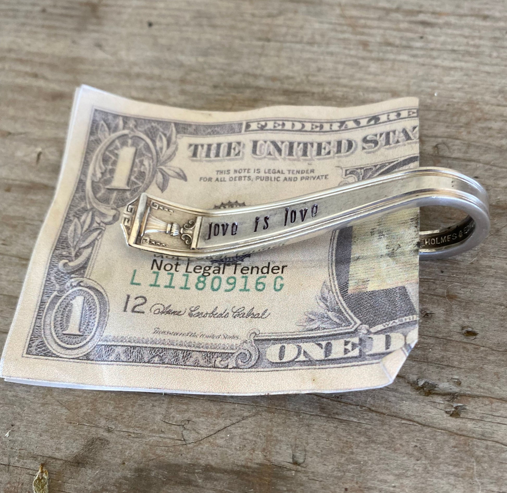 Side view of Century pattern spoon money clip displaying space to hold money and cards