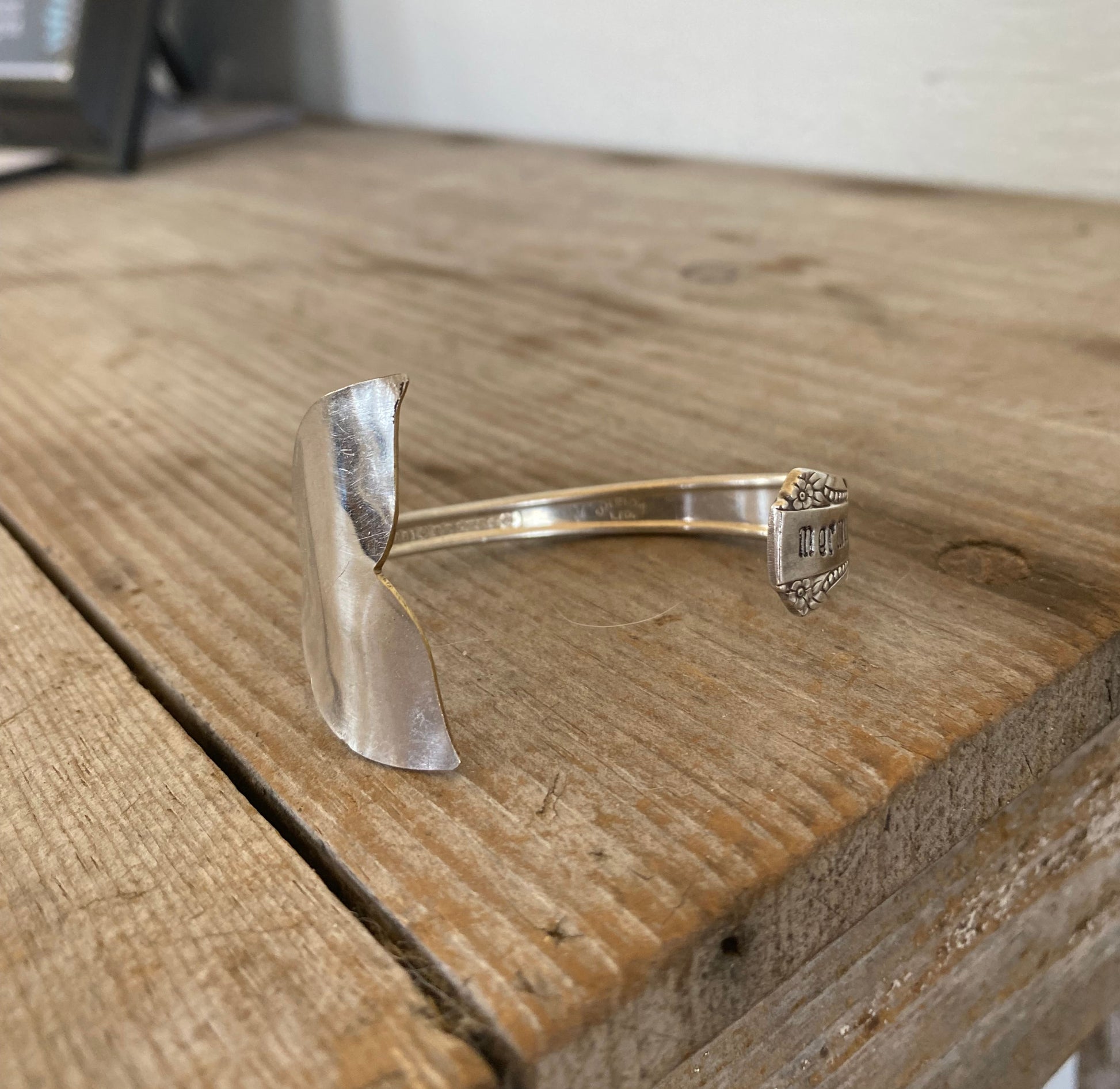 Detail of Mermaid Tail Fin on spoon bowl of Stamped Spoon Bracelet with Mermaid Whale Tail