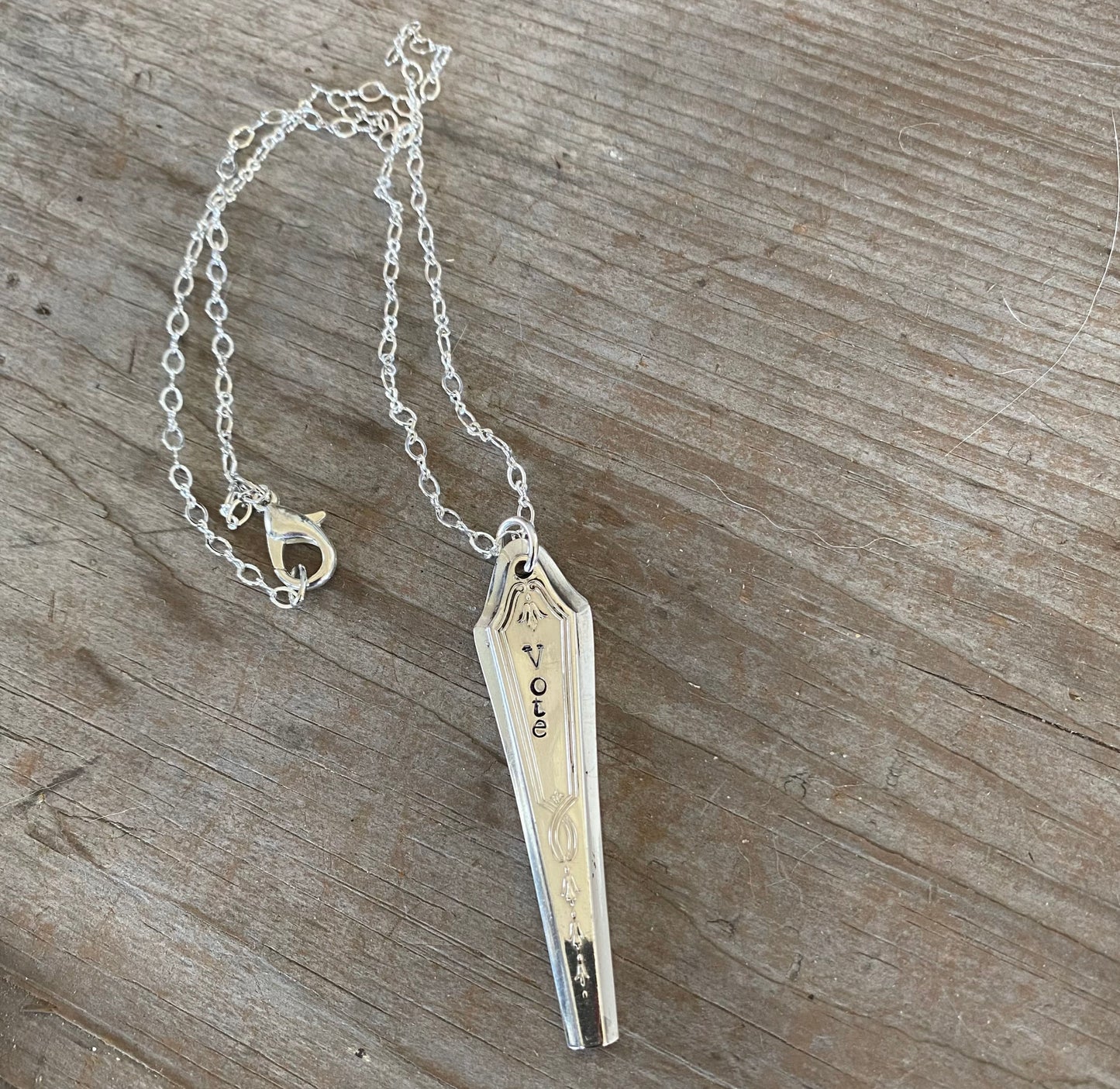 Handcrafted VOTE bar choker necklace hand-stamped on upcycled Tudor Plate Duchess silverplate with typewriter-style font, eco-friendly jewelry