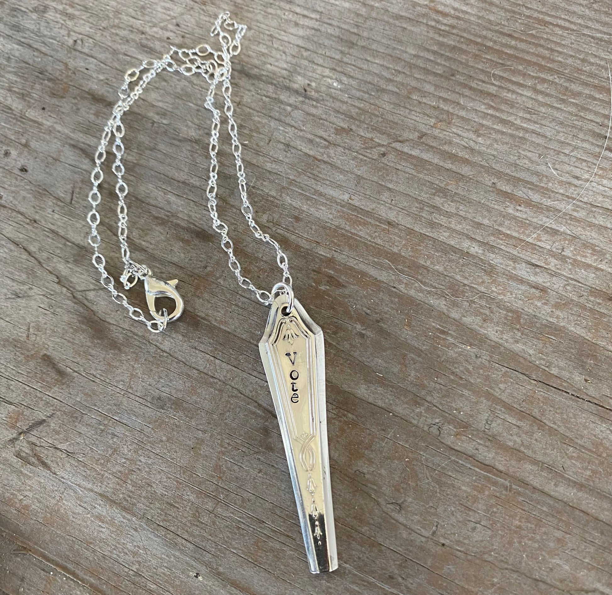 Handcrafted VOTE bar choker necklace hand-stamped on upcycled Tudor Plate Duchess silverplate with typewriter-style font, eco-friendly jewelry