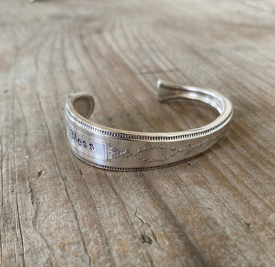 Upcycled silverware cuff bracelet hand stamped with HOT MESS