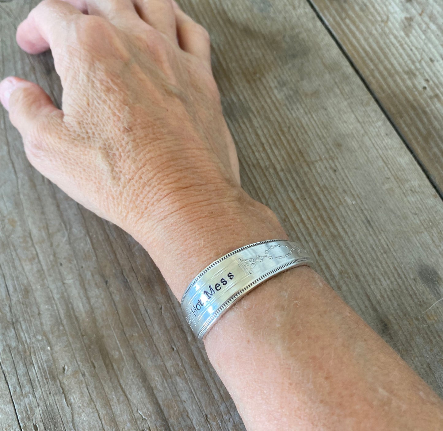 UPcycled spoon cuff bracelet shown on model wrist