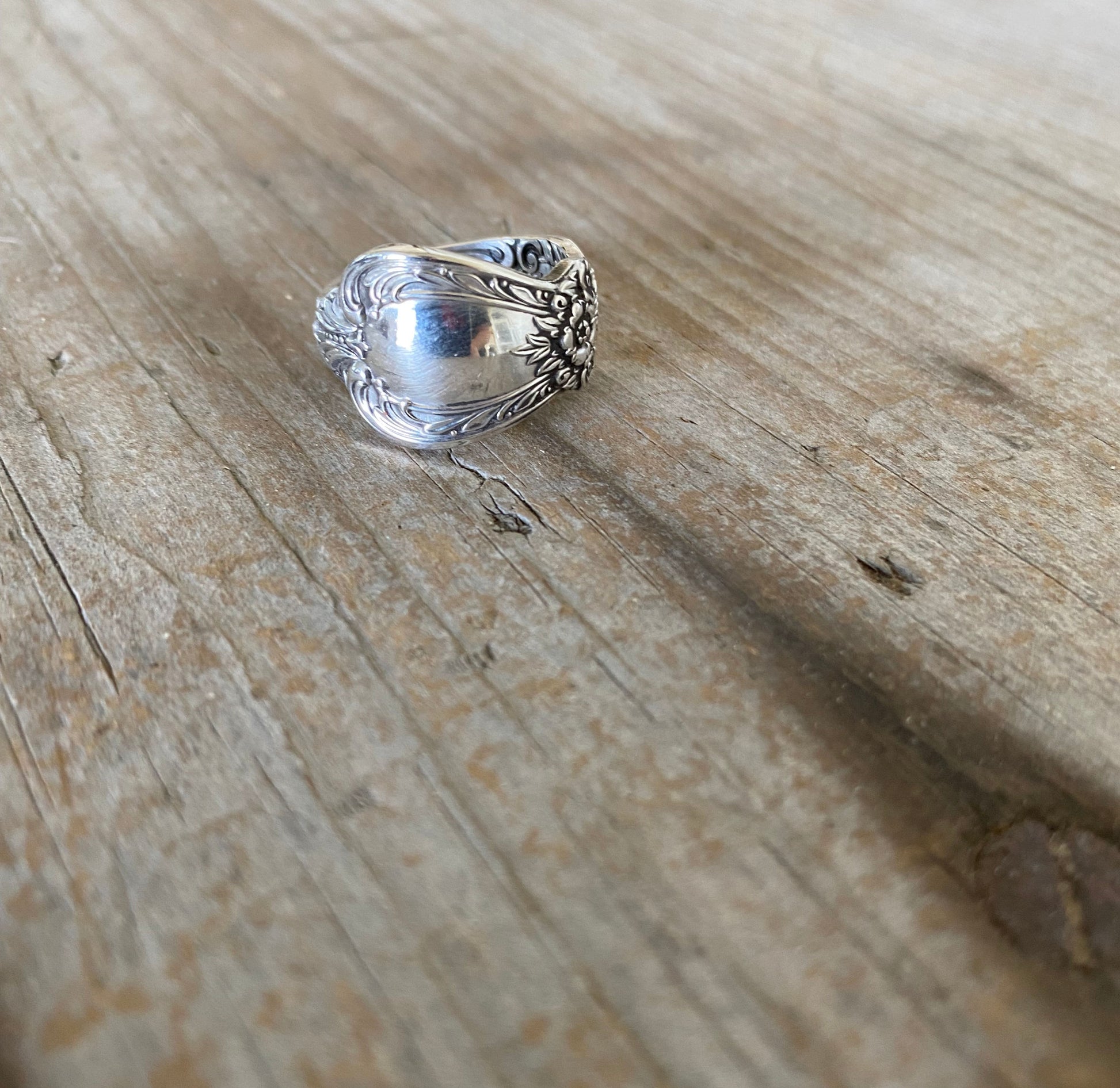 Shiny panel of Spoon ring hand made from vintage spoon handle