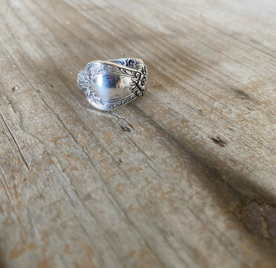 Shiny panel of Spoon ring hand made from vintage spoon handle