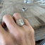 MILANO spoon ring worn on finger displaying size, fit and detail of upcycled vintage silverware ring