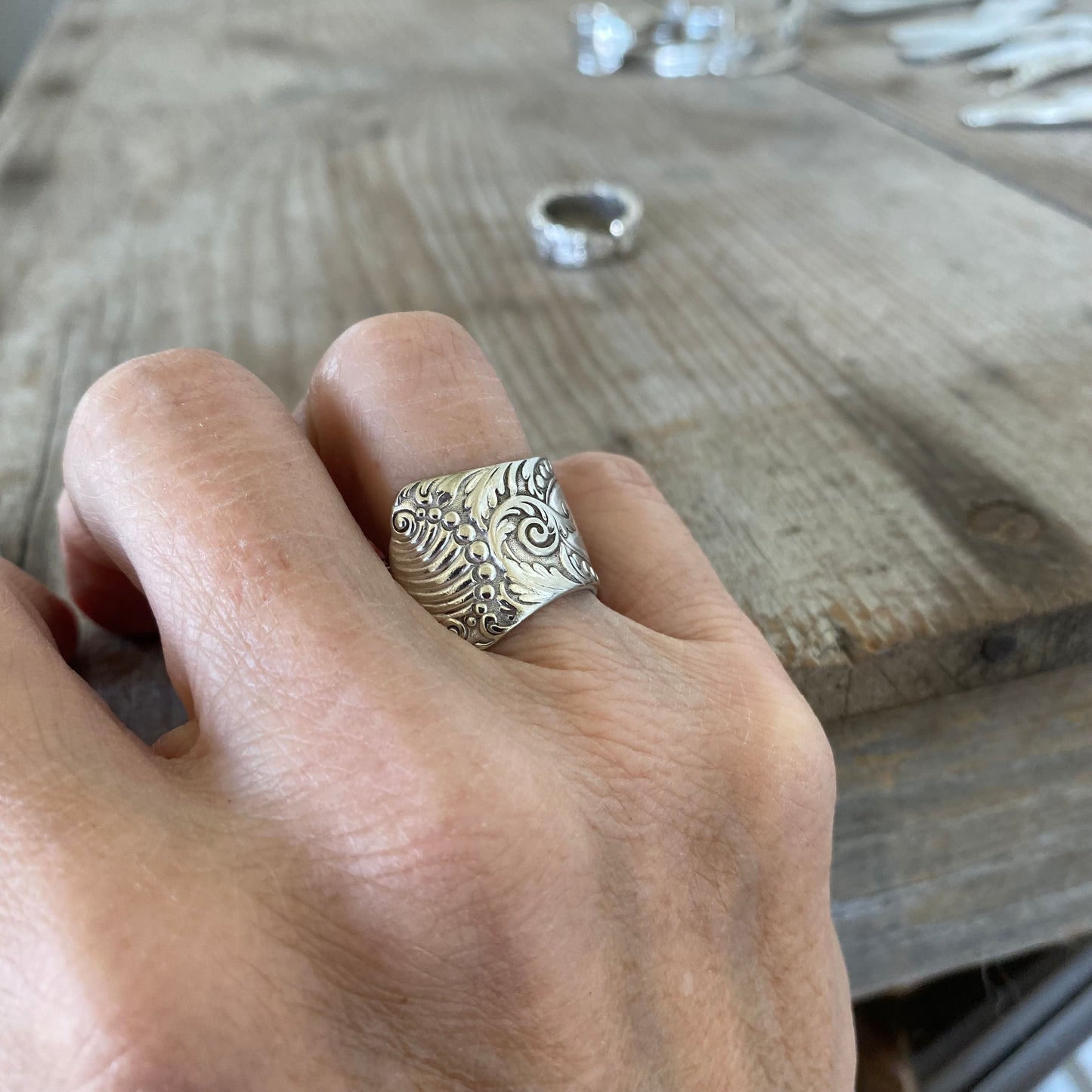 MILANO spoon ring worn on finger displaying size, fit and detail of upcycled vintage silverware ring