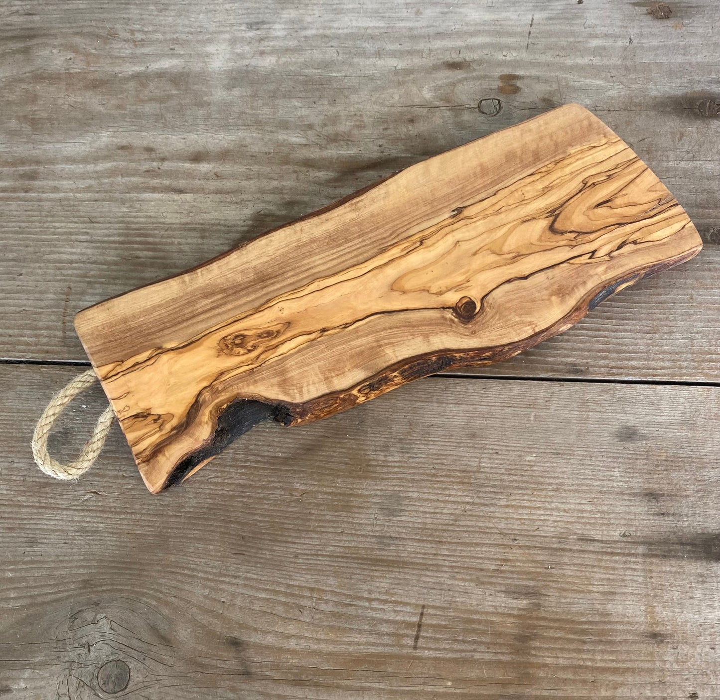 Artisan olivewood charcuterie board - heirloom quality Italian craftsmanship with natural wood grain