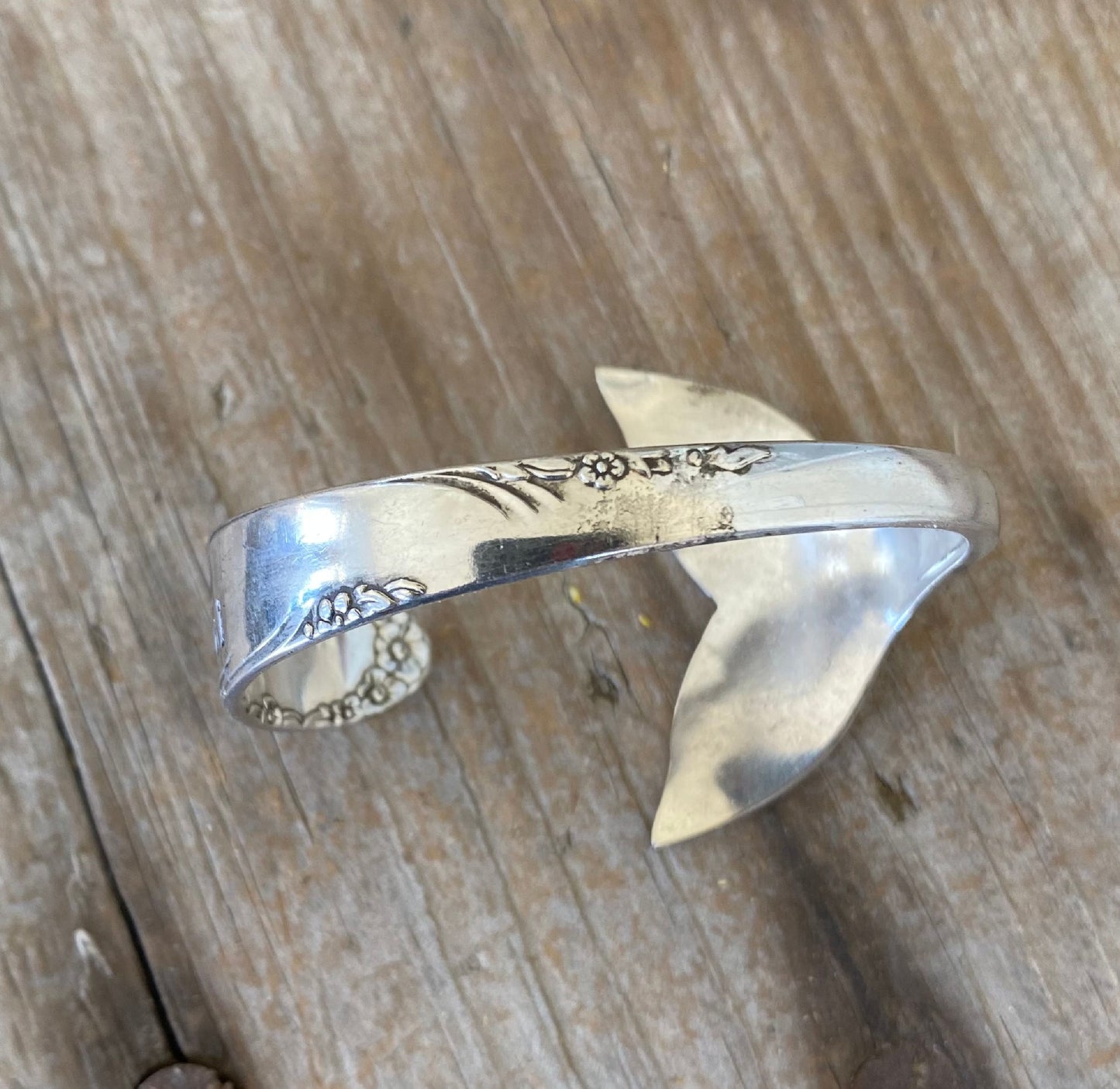 Top view of hand-stamped Mermaid Soul carved mermaid tail spoon cuff bracelet