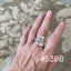 Handmade Shell spoon ring worn on finger displaying size and fit of upcycled silverware ring