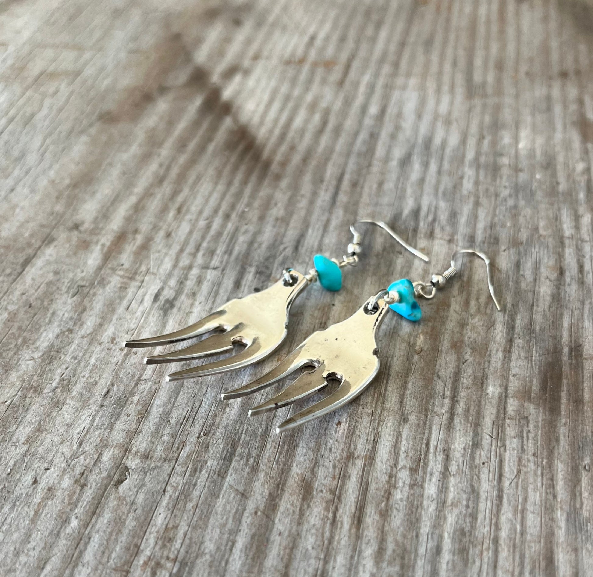 Handcrafted fork tine earrings with turquoise stone chips made from upcycled vintage silverplate cocktail fork