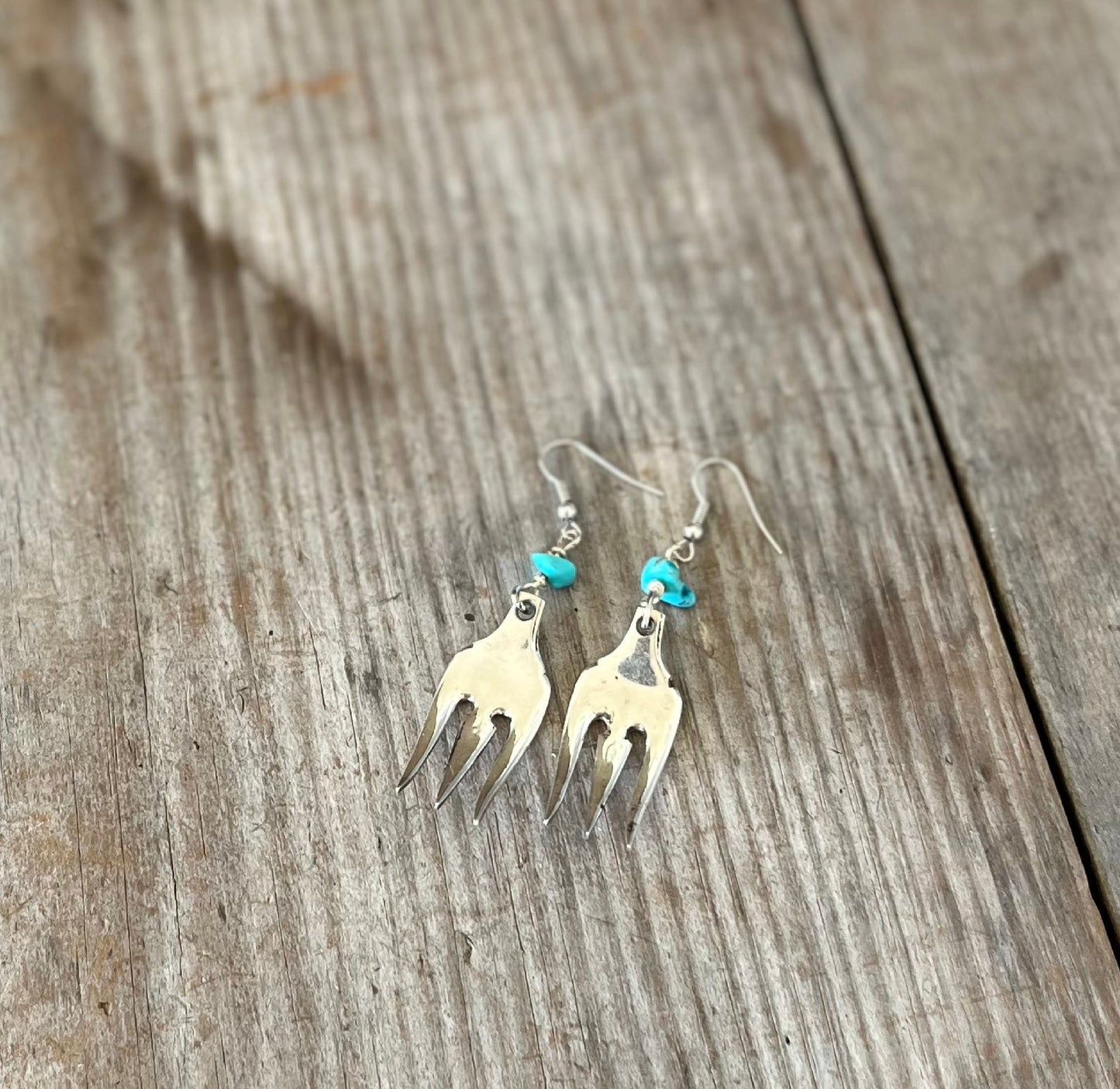 Fork tine earrings with turquoise stone accents showing one-of-a-kind handcrafted design and vintage silverplate patina