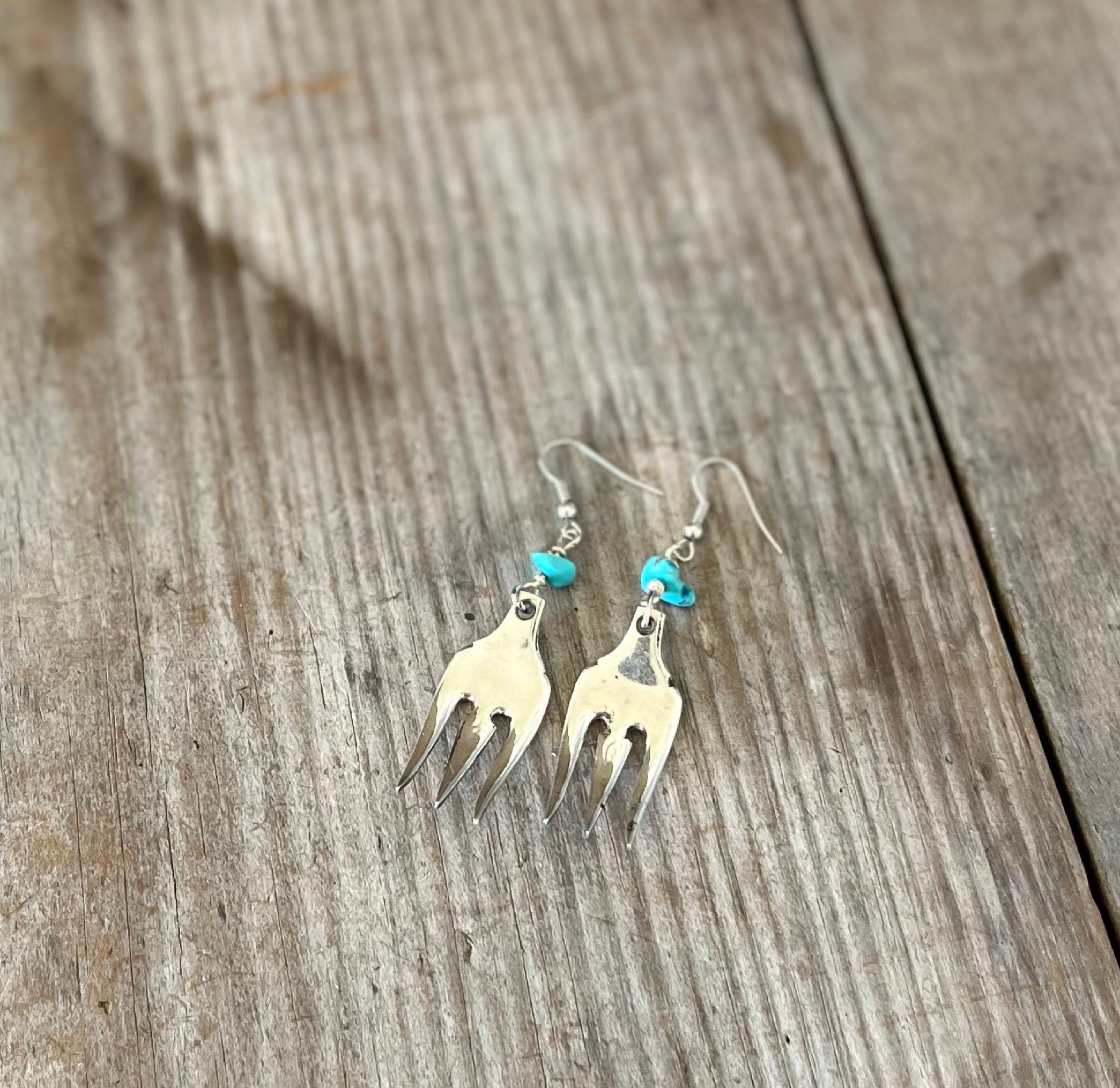Fork tine earrings with turquoise stone accents showing one-of-a-kind handcrafted design and vintage silverplate patina