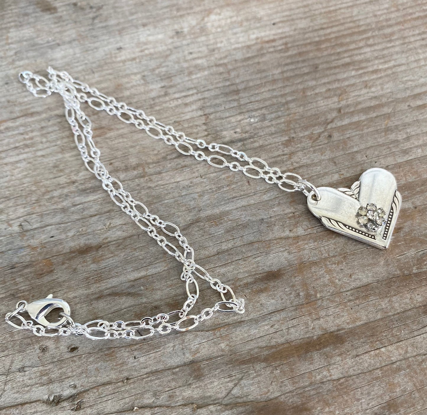 Upcycled Hiawatha pattern spoon heart necklace on 22-inch silverplate loop chain, one-of-a-kind handmade vintage silverware jewelry