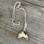 poon whale tail pendant measuring 2-1/4 inches, handcrafted from vintage teaspoon bowl with blue and rhinestone beads, beach jewelry