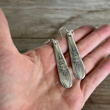 Spoon Earrings shown in hand for scale