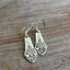 Close-up detail of tender floral nosegay motif on Plantation spoon handle earrings with chartreuse beads, one-of-a-kind 1948 pattern