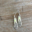 Upcycled spoon earrings showing one-of-a-kind handcrafted design with chartreuse glass accents