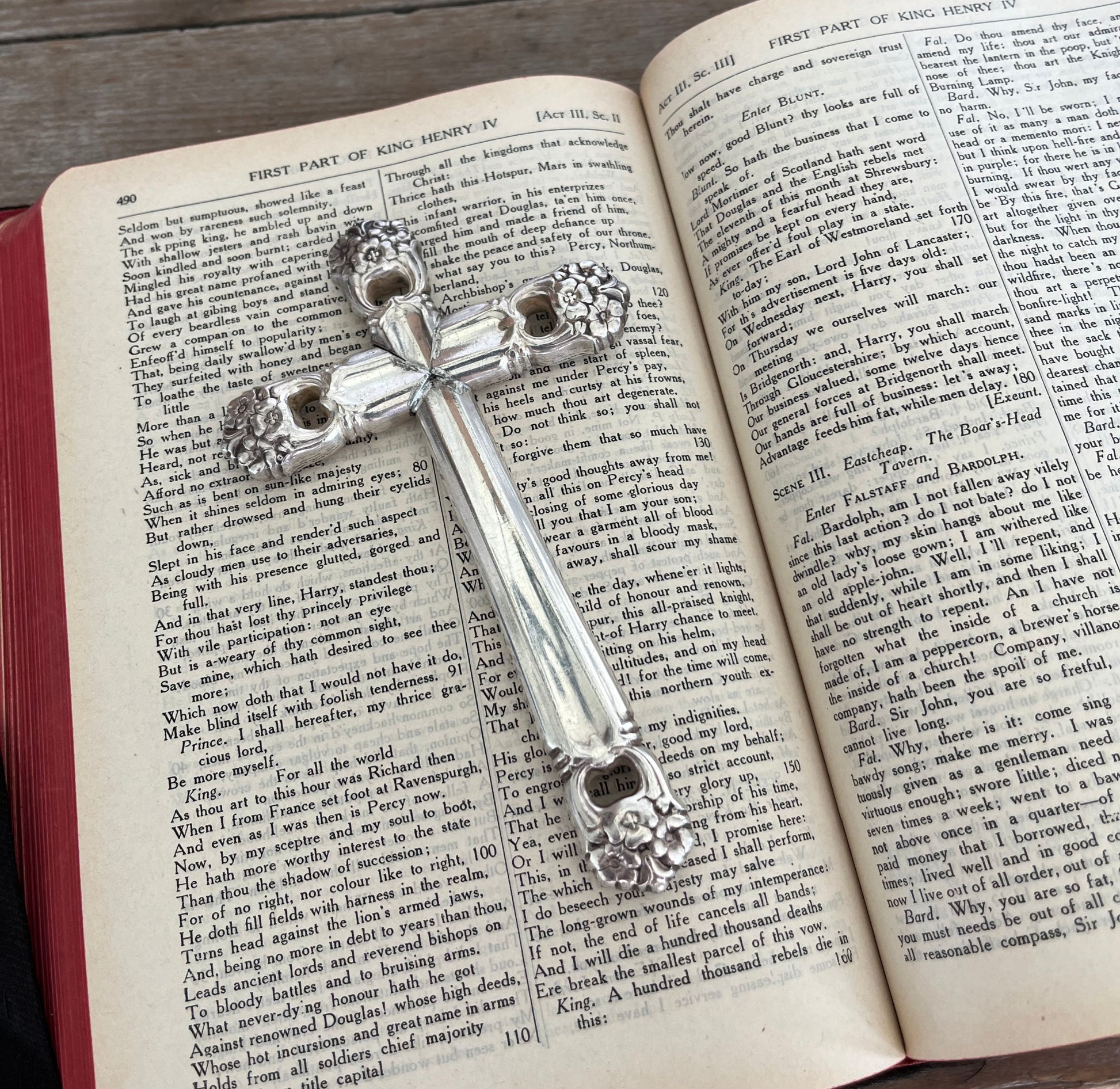 Upcycled knife cross Bible page weight - Eternally Yours pattern vintage silverware - shown in use