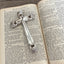 Vintage 1847 Rogers Bros cross-shaped page weight for Bible and devotional reading