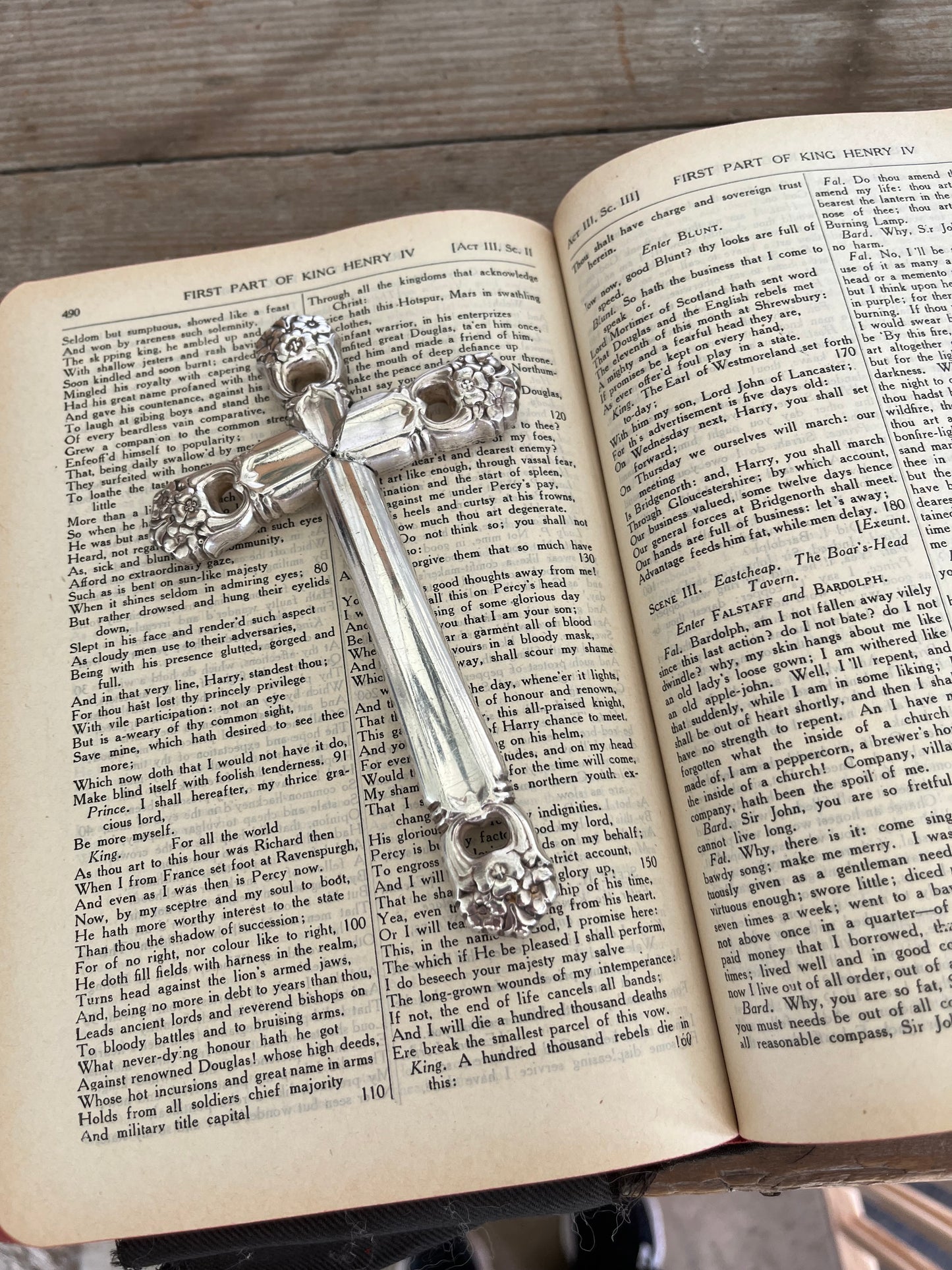 Vintage 1847 Rogers Bros cross-shaped page weight for Bible and devotional reading