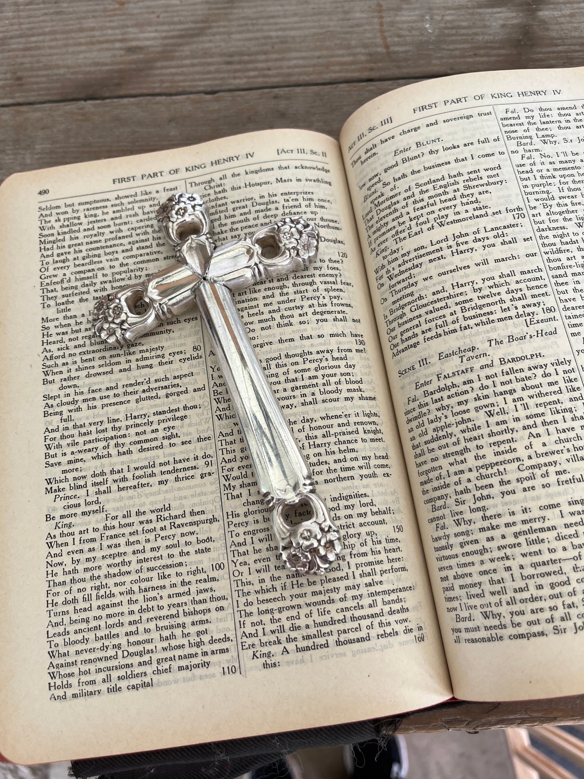 Vintage 1847 Rogers Bros cross-shaped page weight for Bible and devotional reading