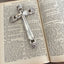 Close-up of Eternally Yours pattern detail on handcrafted cross Bible bookmark from upcycled vintage silverware
