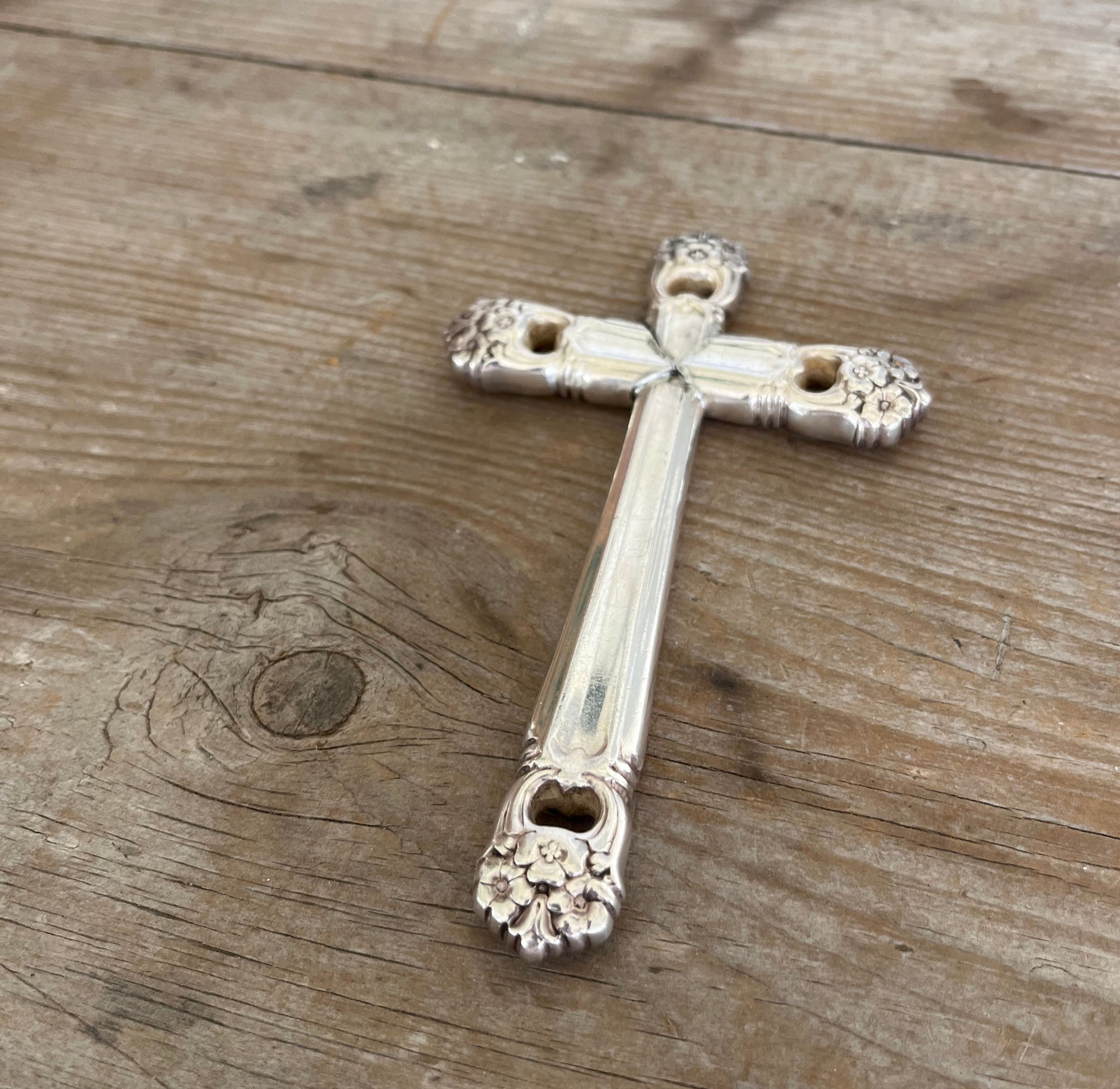 Close-up of Eternally Yours pattern detail on handcrafted silverplate cross Bible bookmark