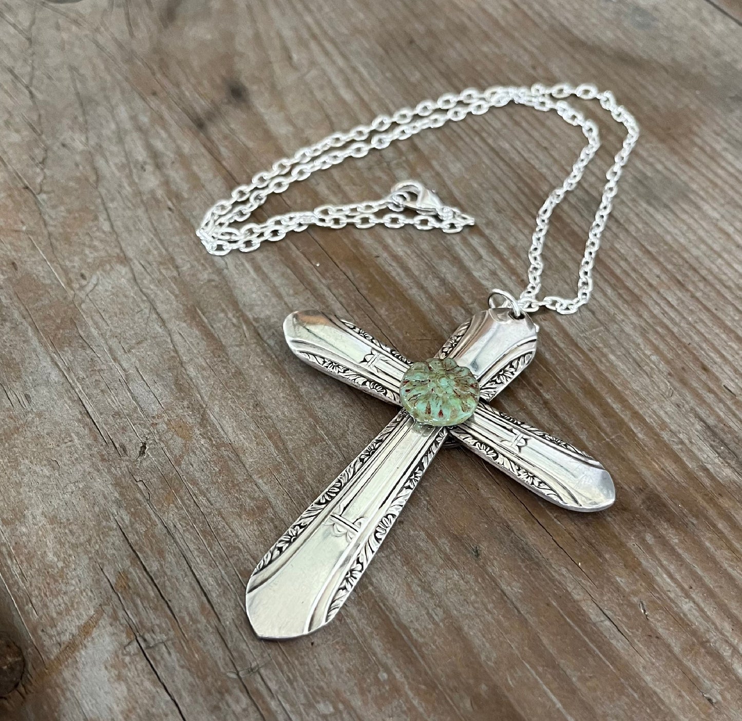 Vintage 1939 William Rogers Regent spoon handles transformed into artisan cross pendant with turquoise bead on 21-inch chain