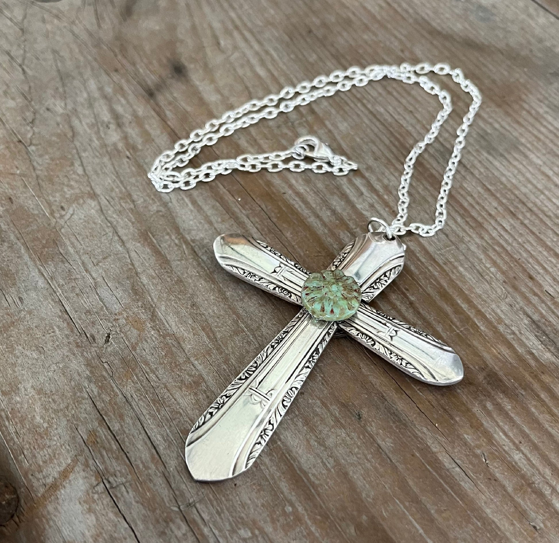 Vintage 1939 William Rogers Regent spoon handles transformed into artisan cross pendant with turquoise bead on 21-inch chain