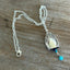 Upcycled vintage silverware bell necklace with blue beads, Lady Densmore pattern by William Rogers 1958