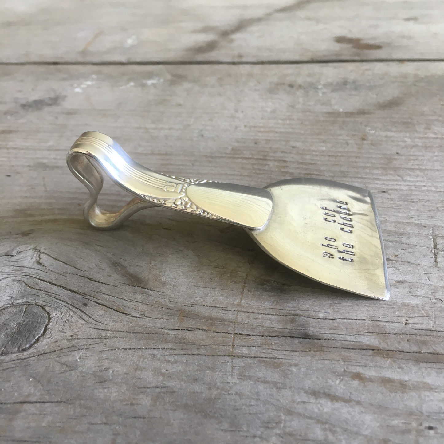 Side View of Handmade Upcycled Spoon Cheese Knife Hand Stamped with Who Cut The Cheese