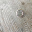 Top view of statement spoon ring featuring stamped art design - artisan silverware
