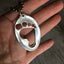 Upcycled Spoon Necklace Hand Punched in Barefoot design Shown in Hand For Scale