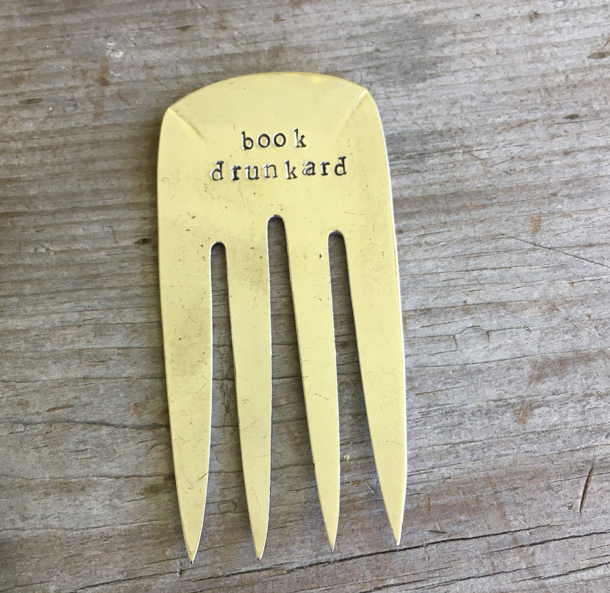 Fork bookmark usage instructions showing how to use vintage silverware bookmark in book