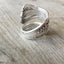 Inside view of coil wrap spoon ring with grapes motif from 1847 Rogers Vintage