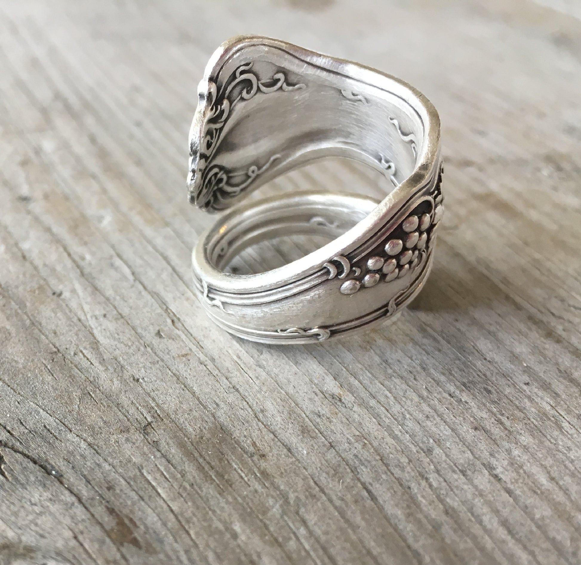 Inside view of coil wrap spoon ring with grapes motif from 1847 Rogers Vintage