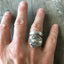 Upcycled Spoon Ring shown on model's hand 
